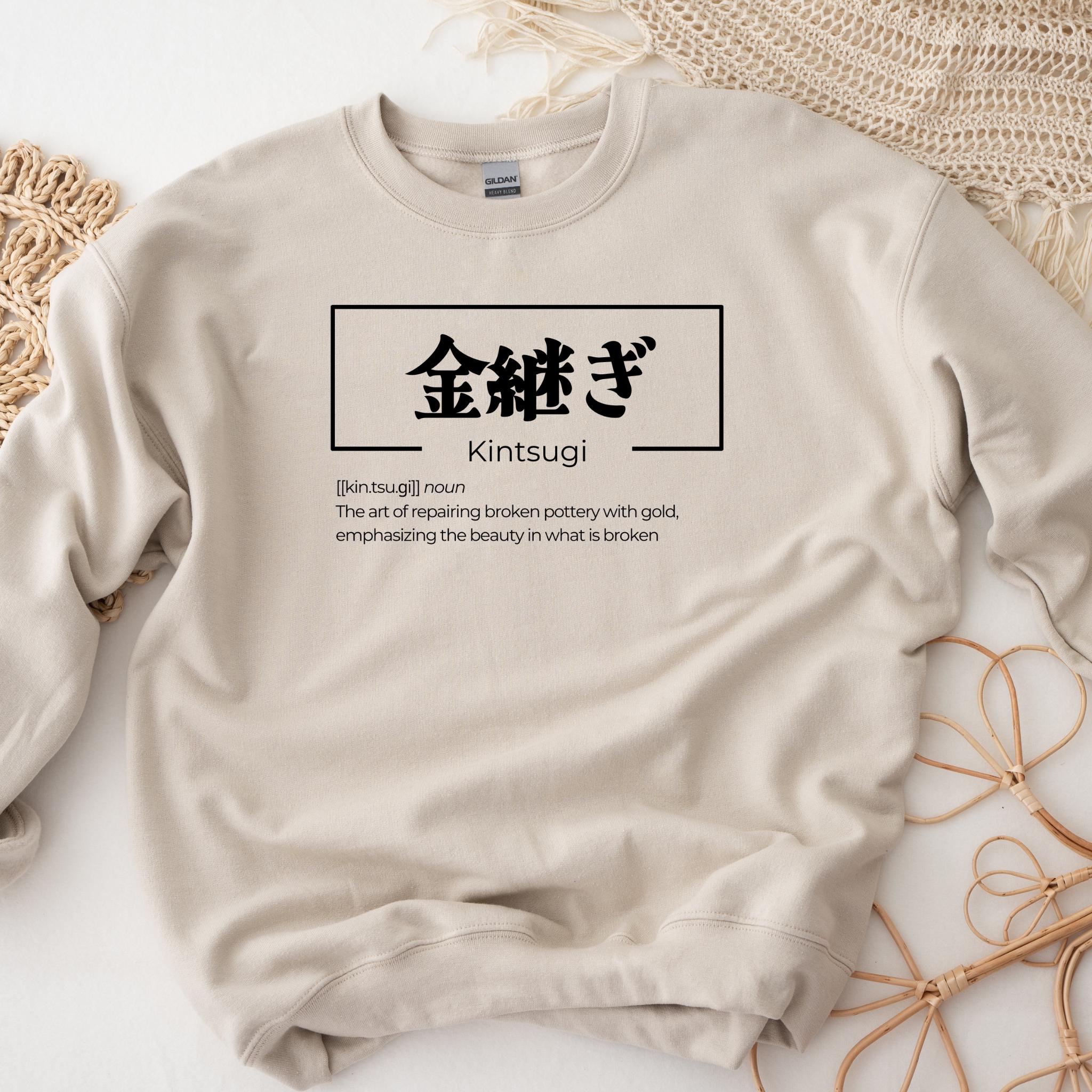 a white sweatshirt with chinese characters on it