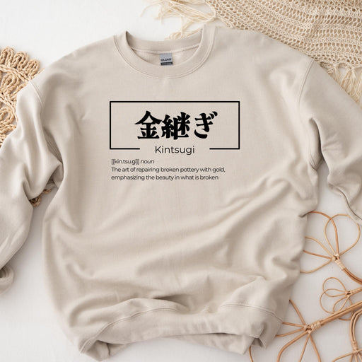 a white sweatshirt with chinese characters on it