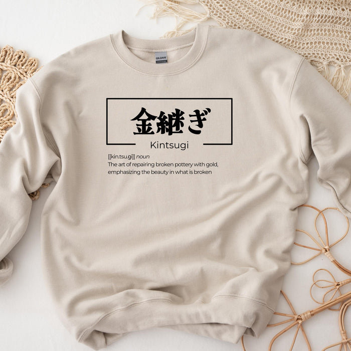 a white sweatshirt with chinese characters on it