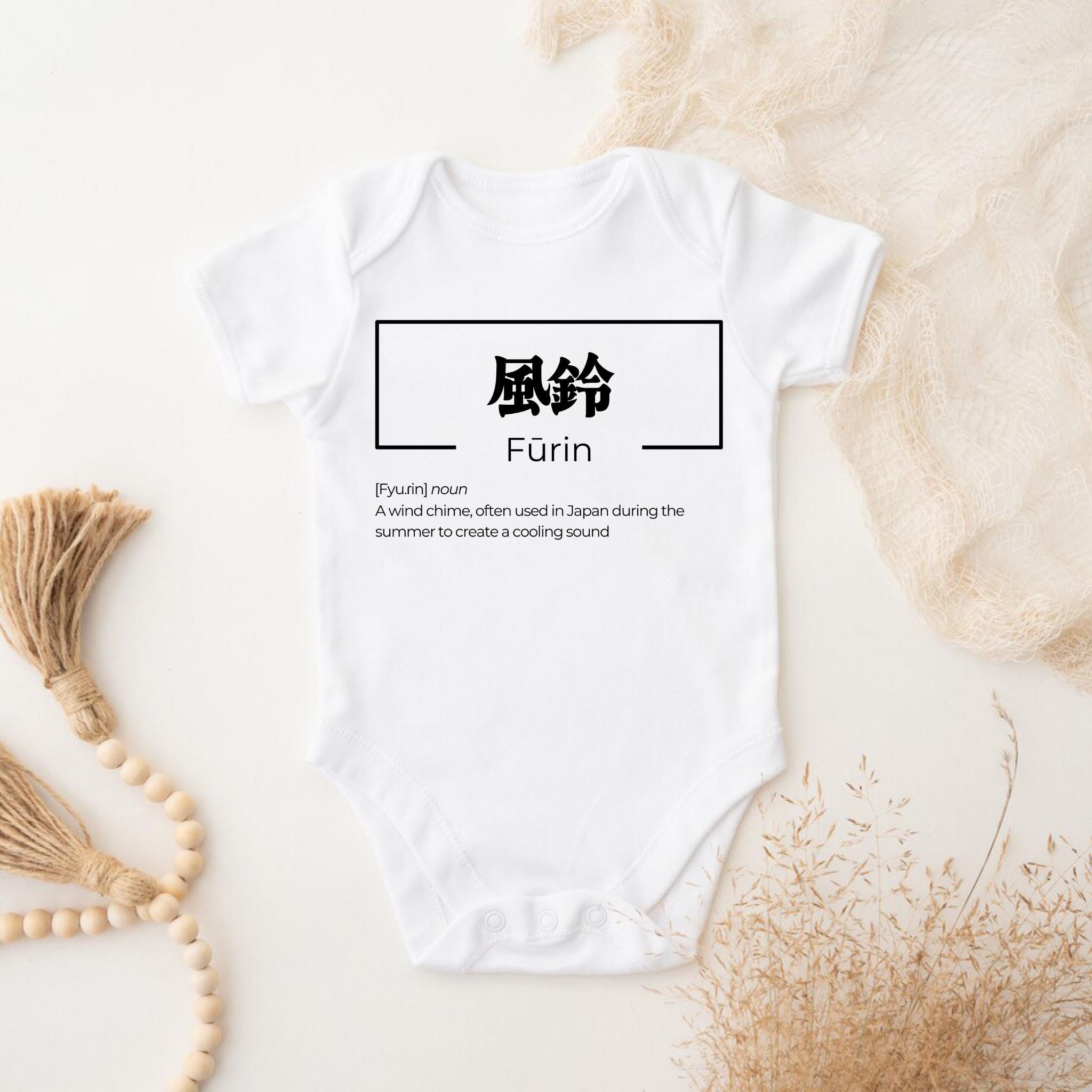 a white bodysuit with chinese characters on it