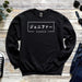 a black sweater with japanese characters on it