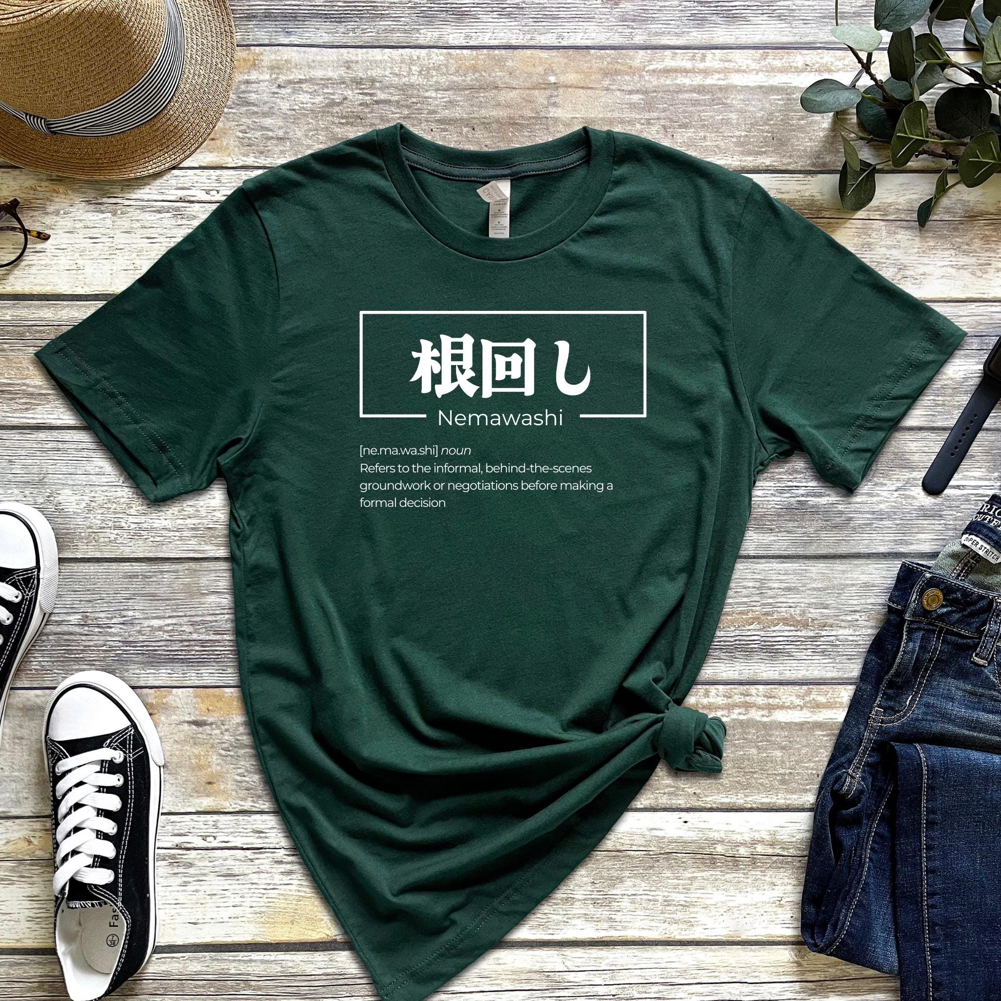 a t - shirt with the japanese language j on it