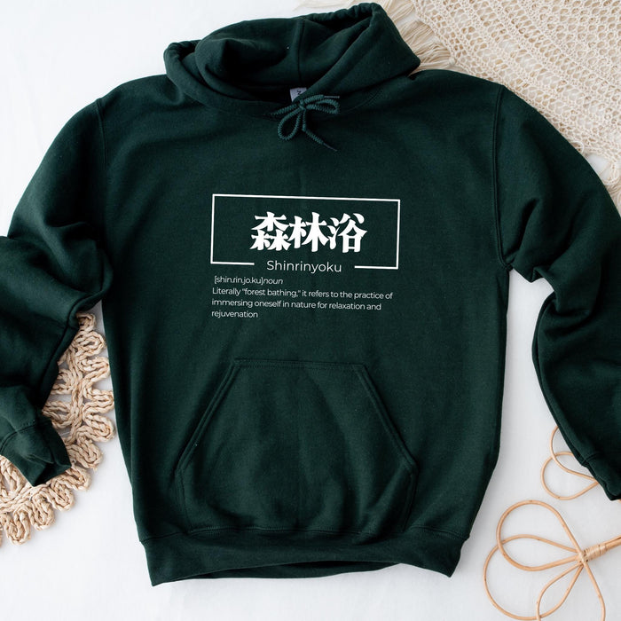 a green hoodie with a picture of a group of people on it