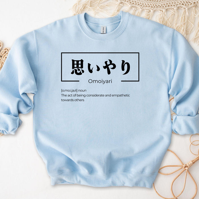 a blue sweatshirt with the words omgyri written in japanese