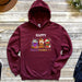a maroon happy thanksgiving sweatshirt with dogs on it