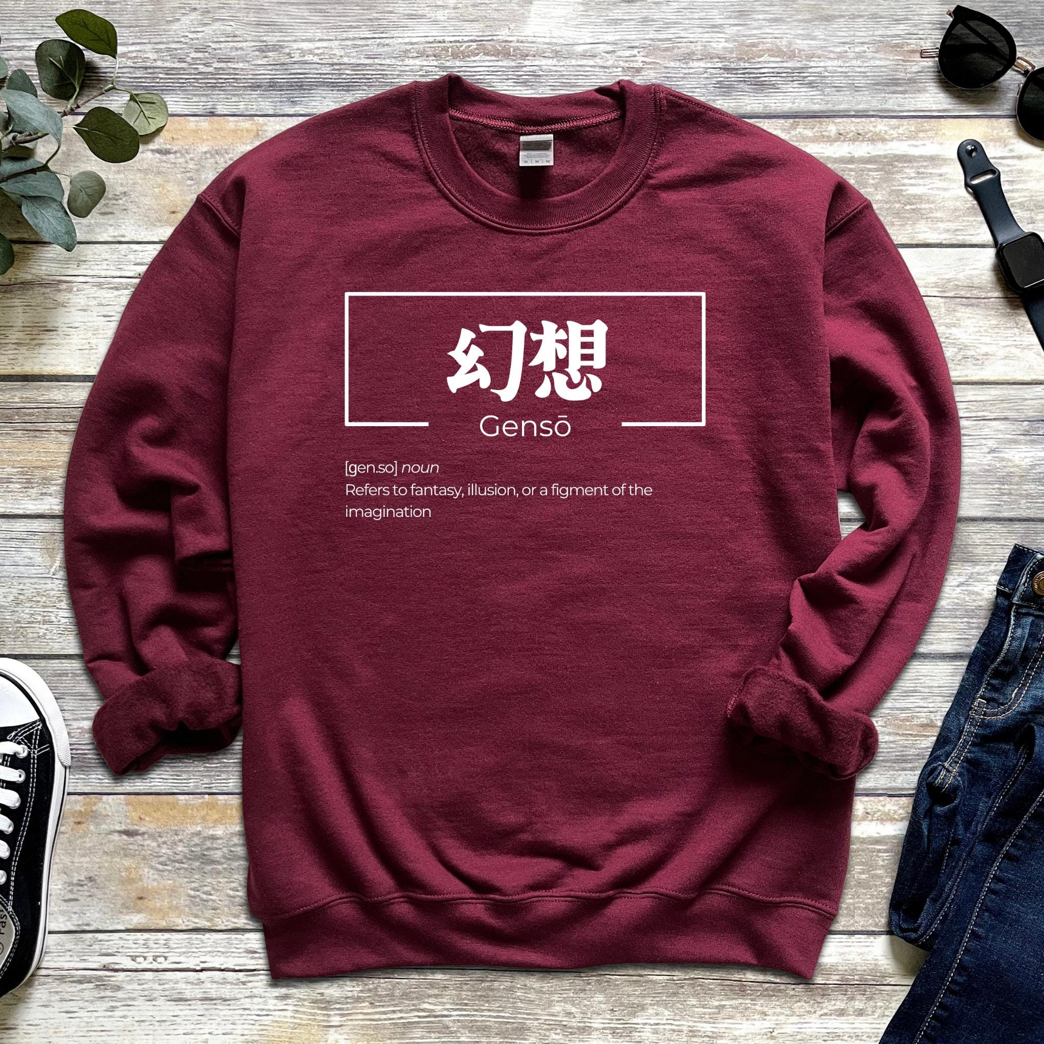 a red sweatshirt with chinese characters on it