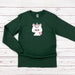 a green sweatshirt with a unicorn on it