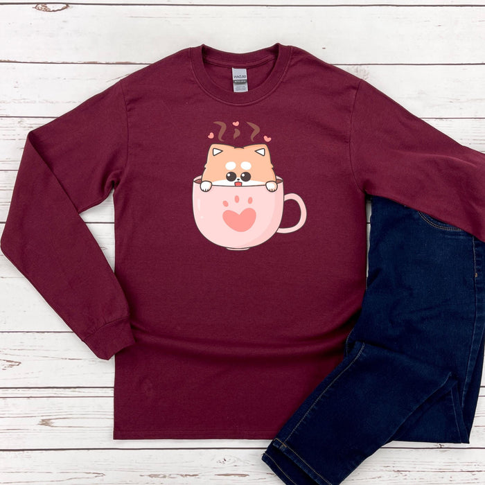 a red shirt with a cat in a cup on it