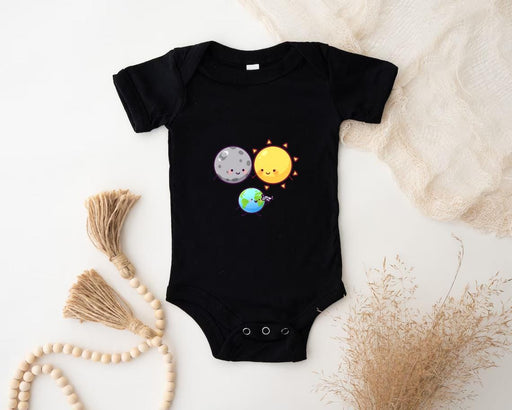 a baby bodysuit with a picture of the earth and sun on it