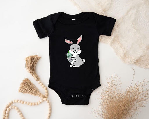 a black bodysuit with a rabbit holding a carrot