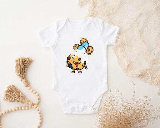 a baby bodysuit with a picture of a dog with a bow on it