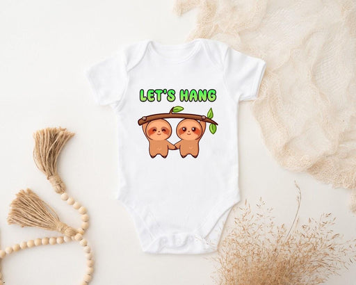 a baby bodysuit that says let&#39;s hang on it