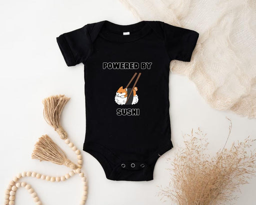 a baby bodysuit that says powered by sushi
