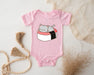 a pink baby bodysuit with a sushi cat on it