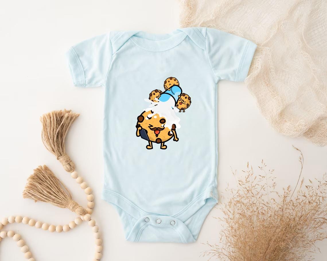 a baby bodysuit with a picture of a dog on it