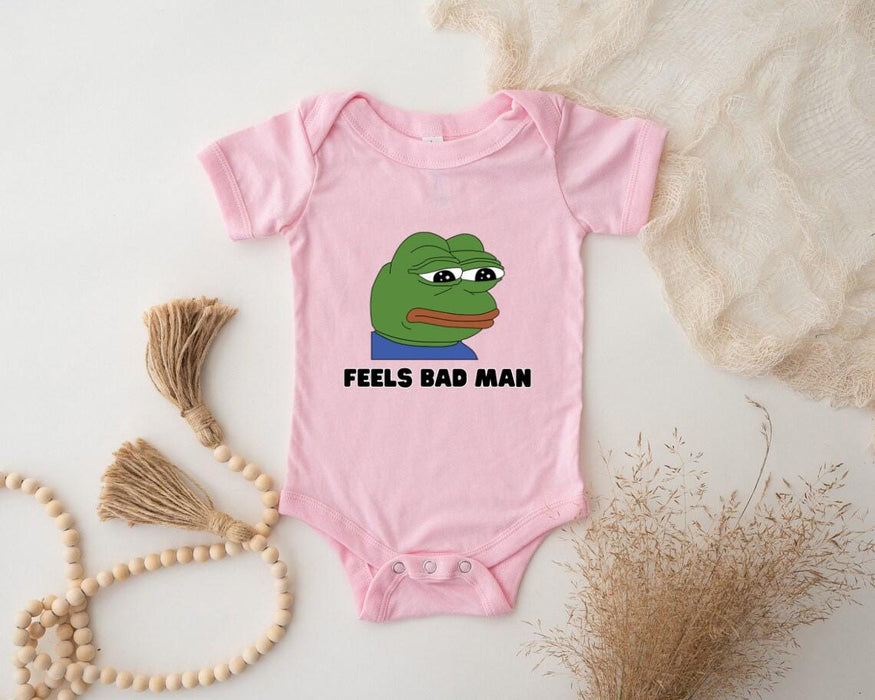 a baby bodysuit with the words feels bad man printed on it