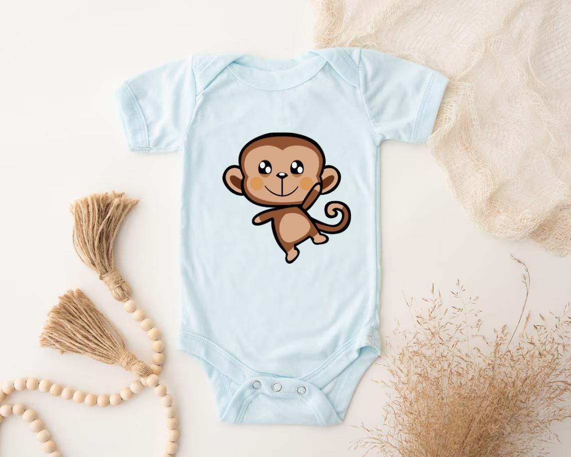 a baby bodysuit with a cartoon monkey on it