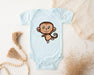 a baby bodysuit with a cartoon monkey on it