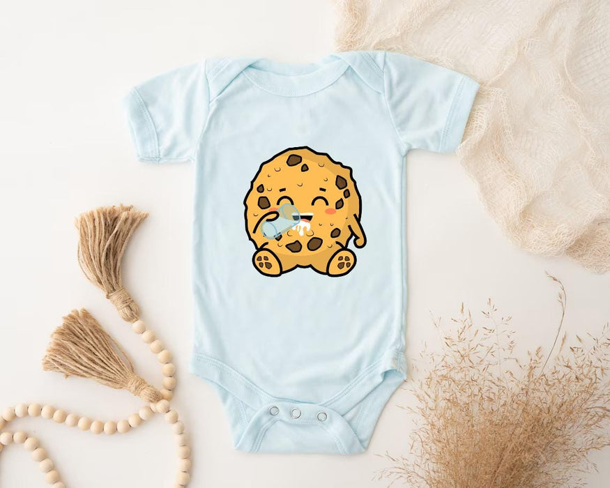 a baby bodysuit with a cookie on it