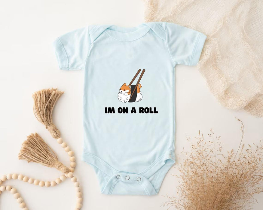 a baby bodysuit that says i&#39;m on a roll with a sushi