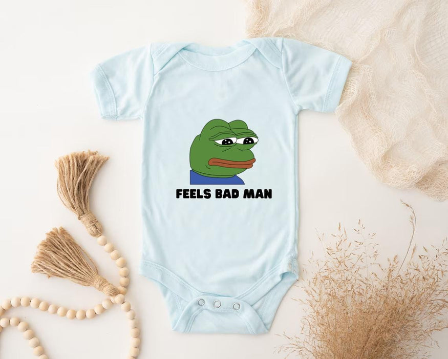 a baby bodysuit with the words feels bad man printed on it
