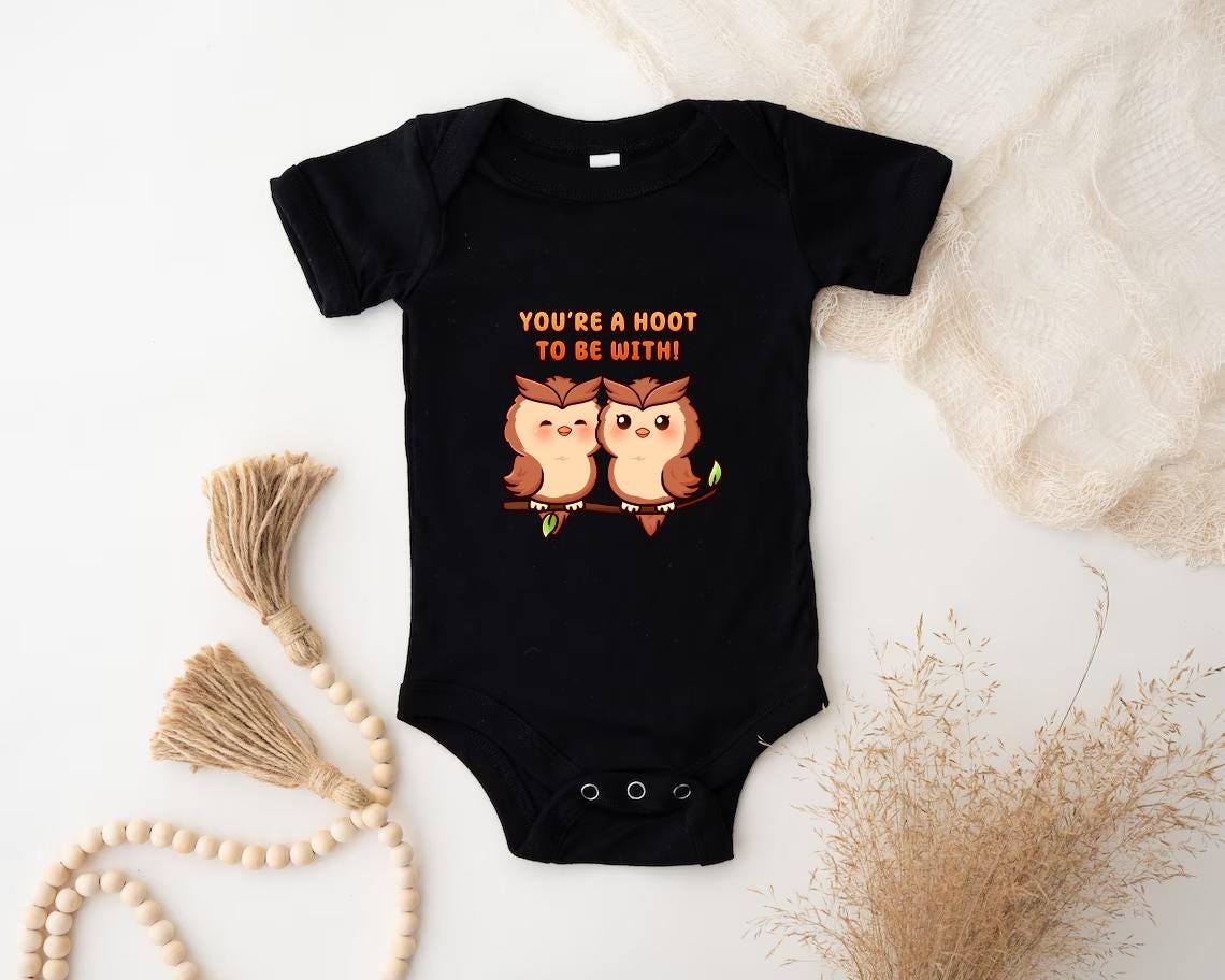 a baby bodysuit with two owls saying you're a hoot to be