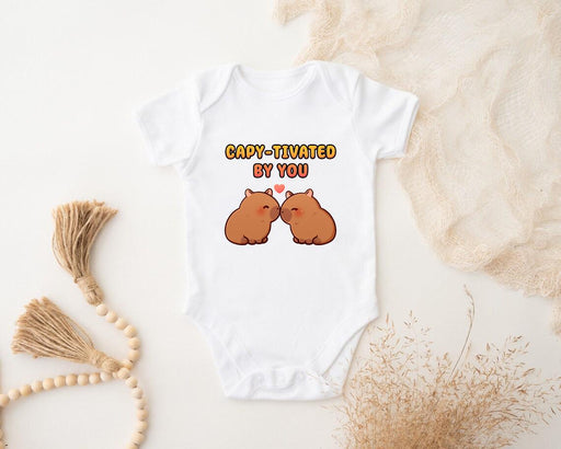 a baby bodysuit with two brown bears on it