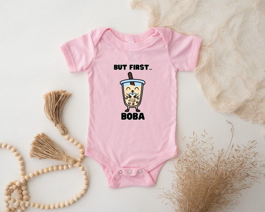 a baby bodysuit with a picture of a cartoon character on it
