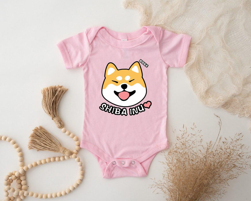 a pink baby bodysuit with a cartoon dog on it