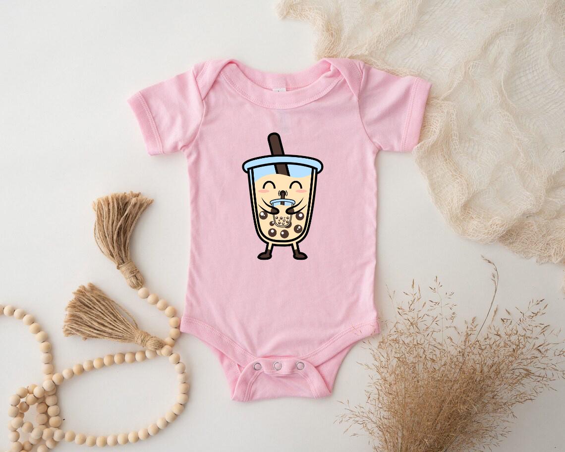 a baby bodysuit with a picture of a drink on it