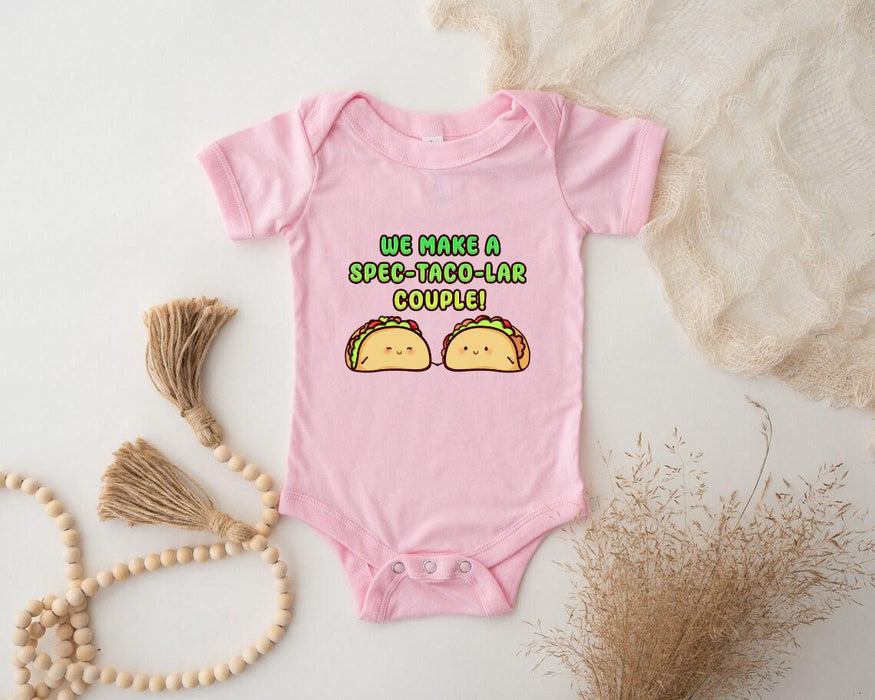a baby bodysuit with two tacos printed on it