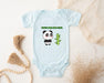 a baby bodysuit with a panda holding a cactus