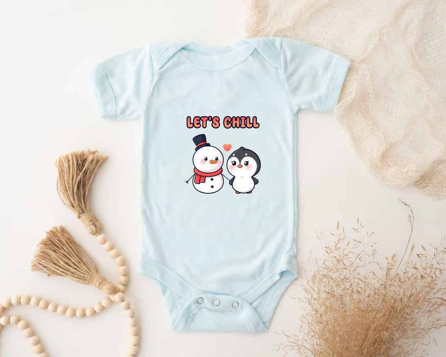 a baby bodysuit with a snowman and penguin on it