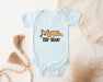 a baby bodysuit with a corgi on it