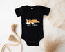 a baby bodysuit with a corgi on it