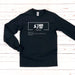 a black long - sleeved shirt with chinese writing on it