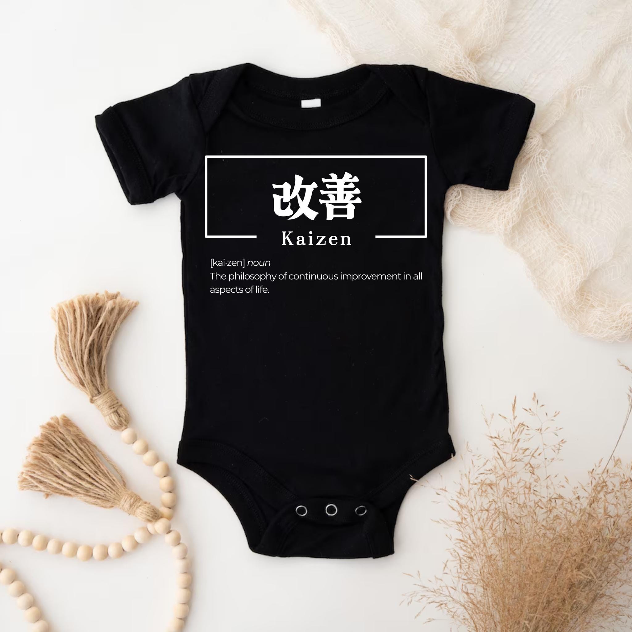 a black bodysuit with the words kazen on it