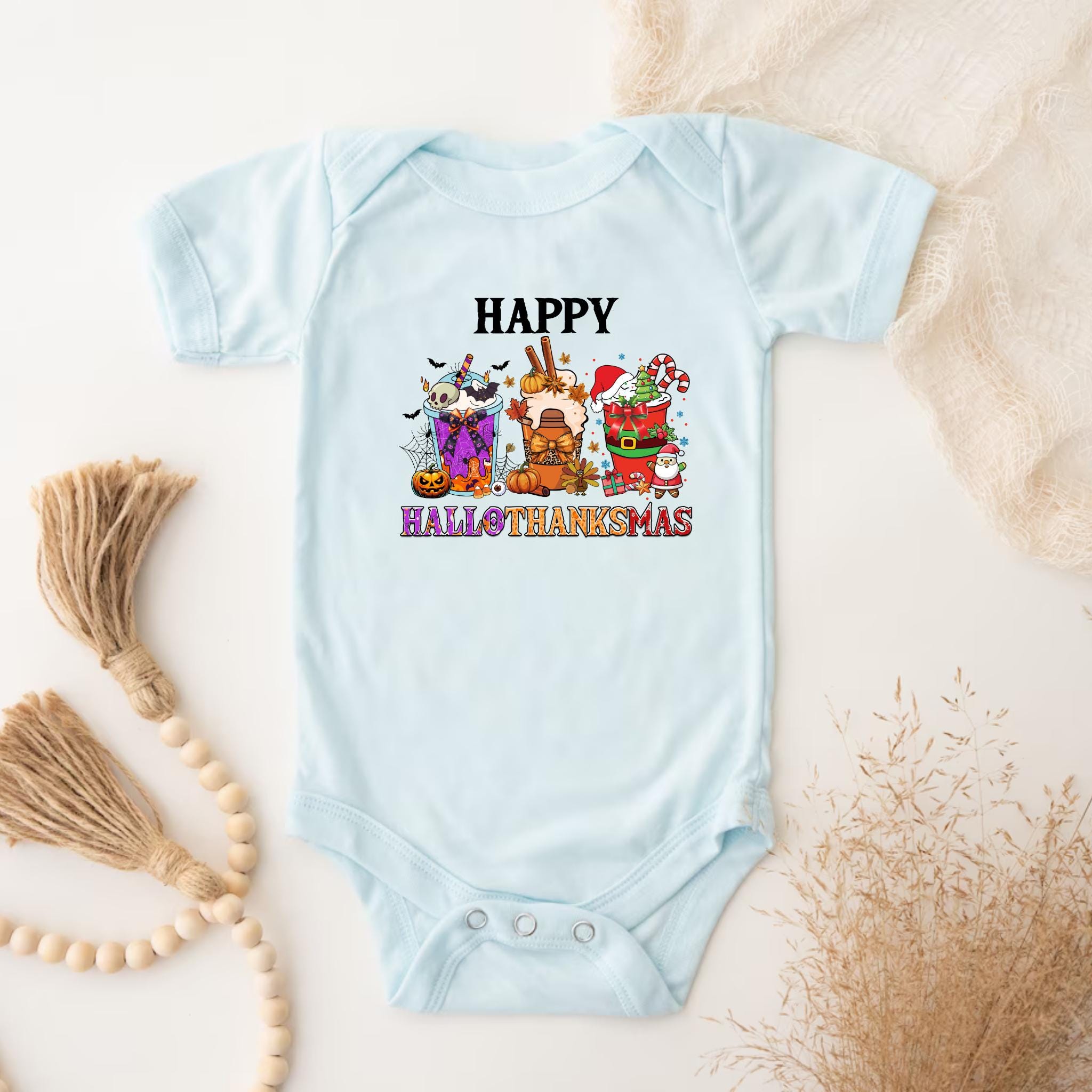 a baby bodysuit that says happy halloween