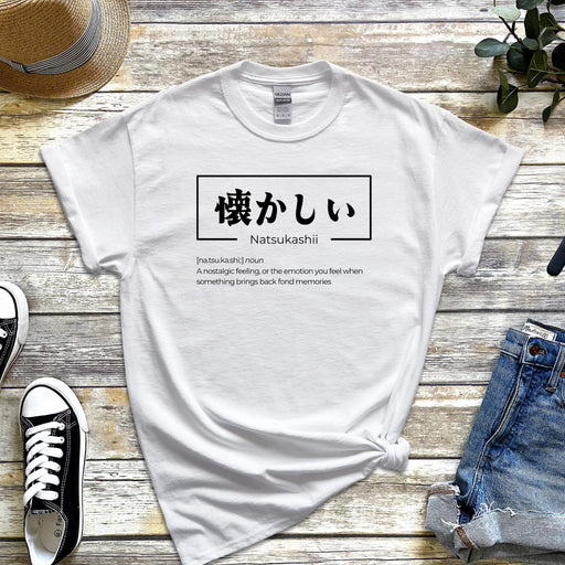 a white t - shirt with japanese characters on it