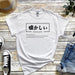 a white t - shirt with japanese characters on it