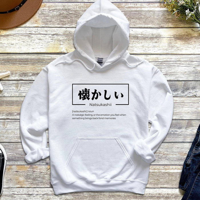 a white hoodie with japanese characters on it