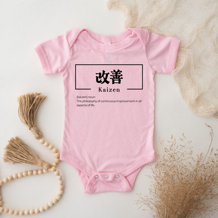 a baby bodysuit with chinese characters on it