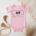 a baby bodysuit with chinese characters on it