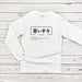 a white long - sleeved shirt with japanese characters on it