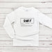 a white long sleeve shirt with chinese characters on it