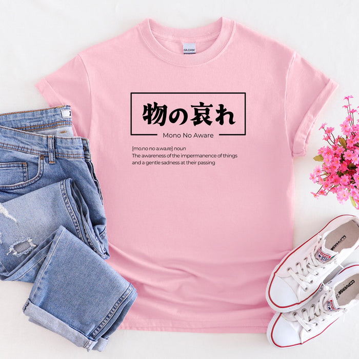 a pink shirt with japanese characters on it