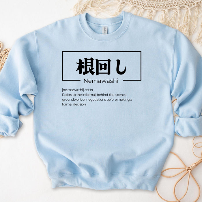 a blue sweatshirt with the words nemawash on it