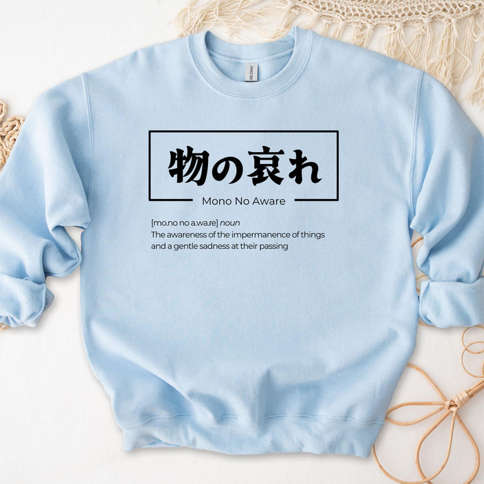 a blue sweatshirt with japanese writing on it