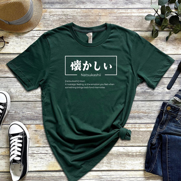 a green t - shirt with japanese characters on it