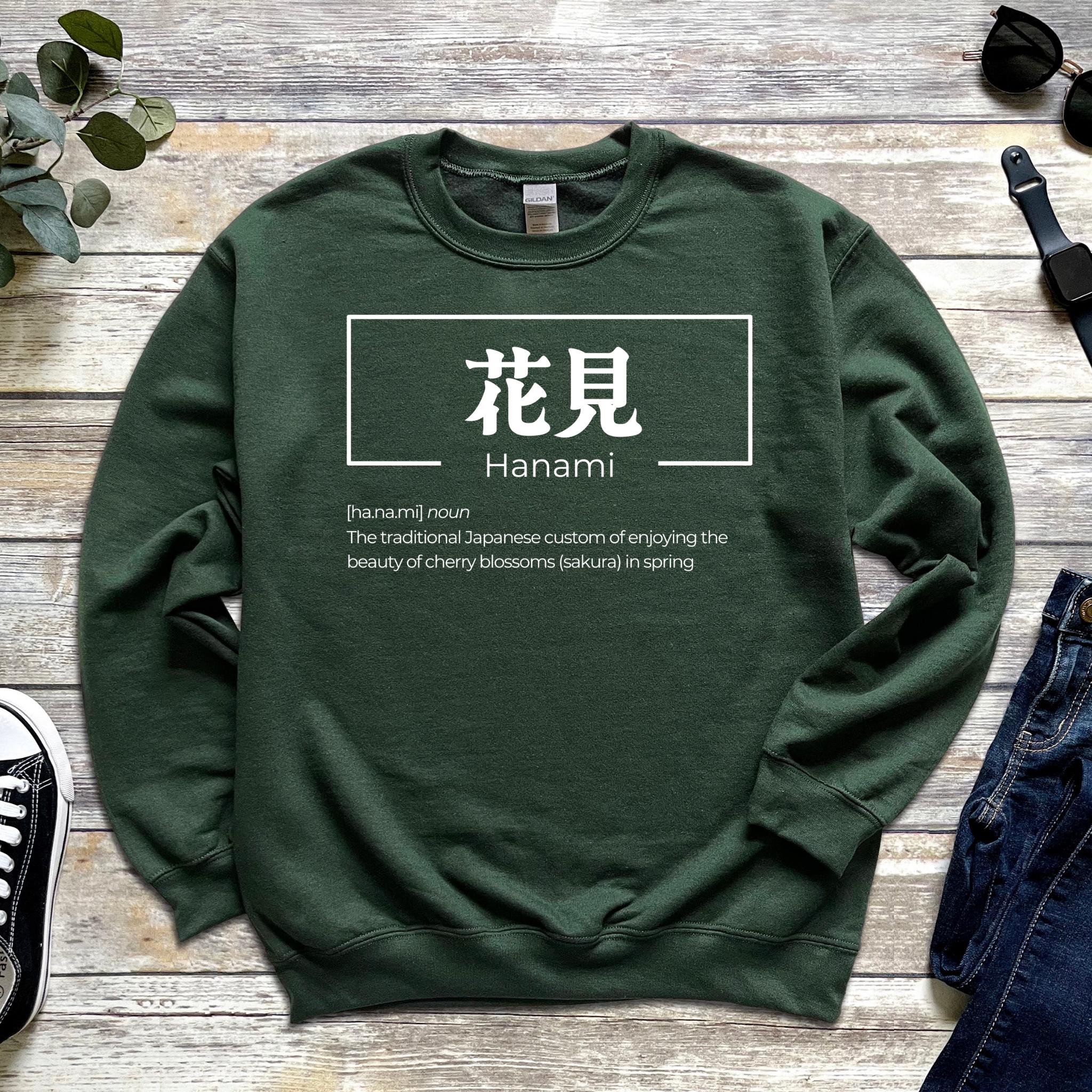 a green sweatshirt with the words hamami on it
